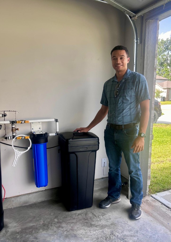 Walkthrough at a completed softener and pre-filter installation in a Houston-area garage